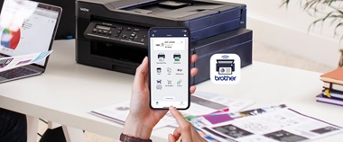 Mobiltelefon og printer.