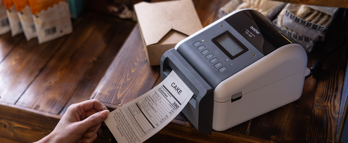 image of TD-4D linerless printer and labels