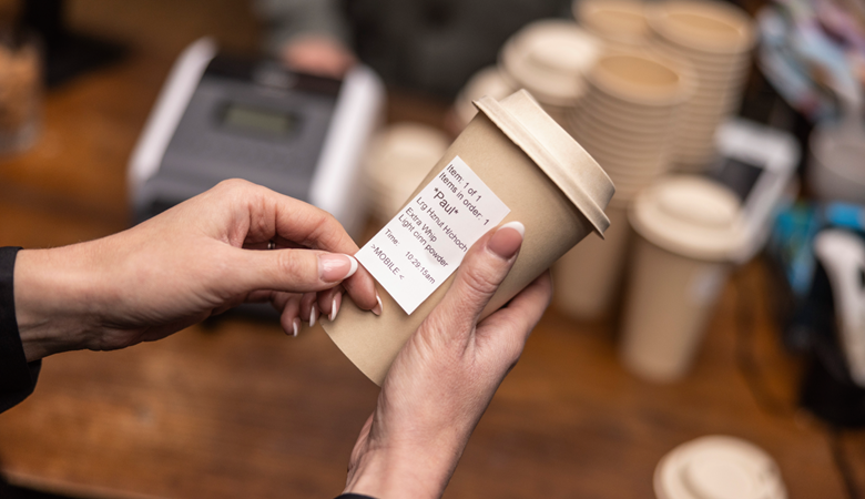 label attached to a coffee cup