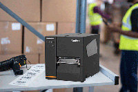 TJ-labelprinter p bord med labels p et lager