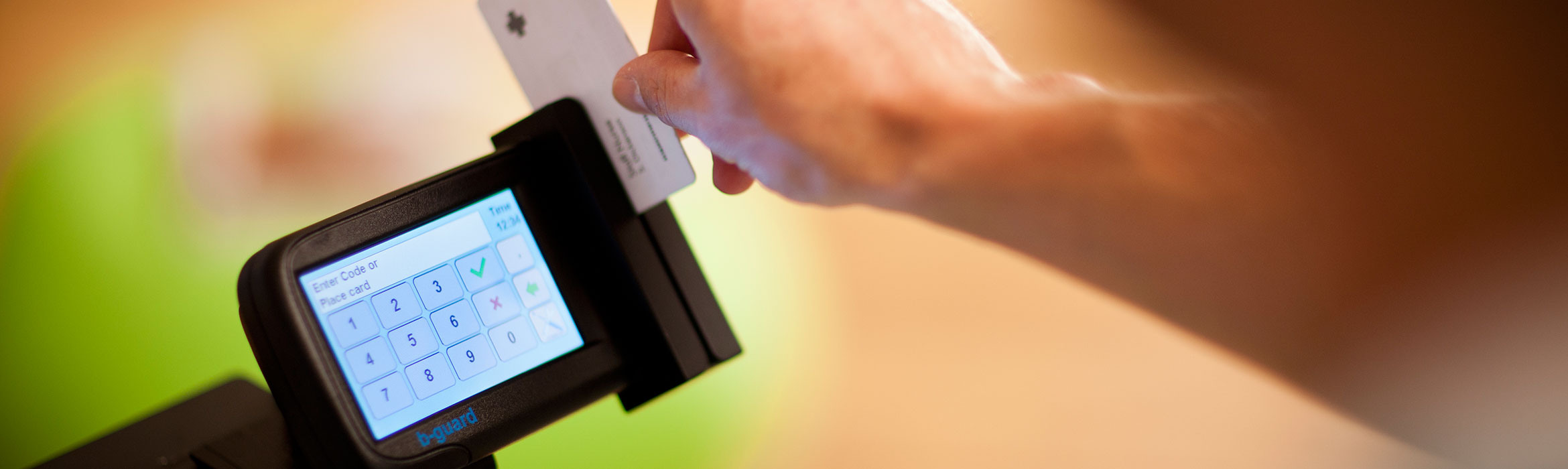 Person swiping ID card